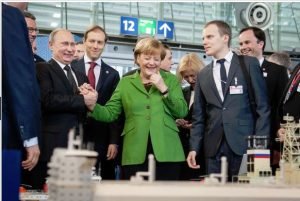 Putin con Angela Merkel